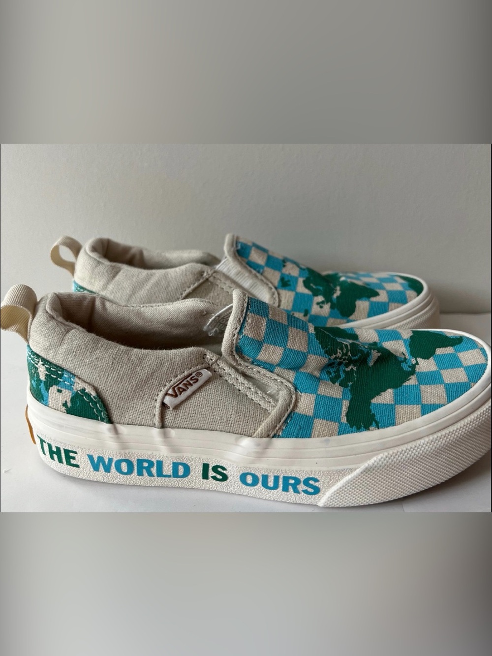Vans Kids “The World is Ours” Slip-On Sneakers in Teal and Cream Checkerboard 12